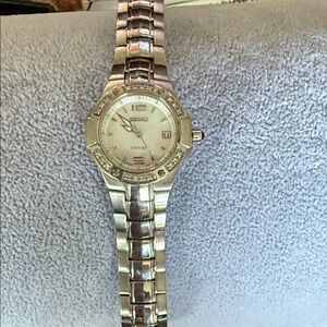 Seiko couture Women's Silver Watch needs battery with White mother of pearl Dial